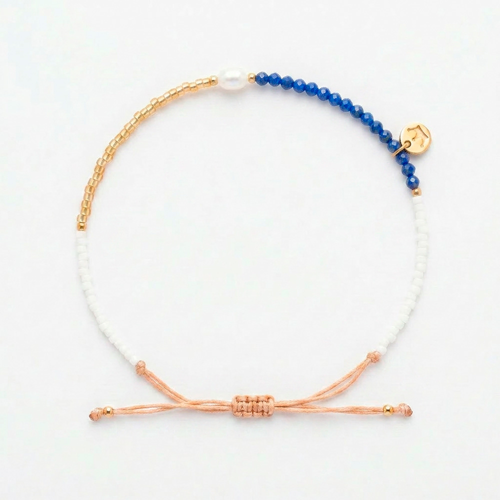white 4mm oval freshwater pearl adjustable bracelet with semi-precious stones and white and yellow gold coloured beads