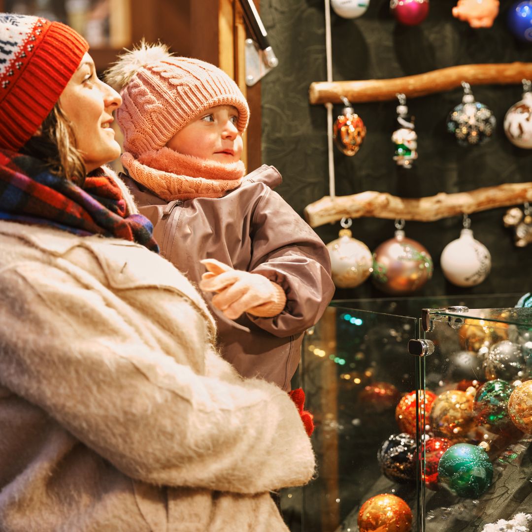 mother and child shopping at Christmas Market