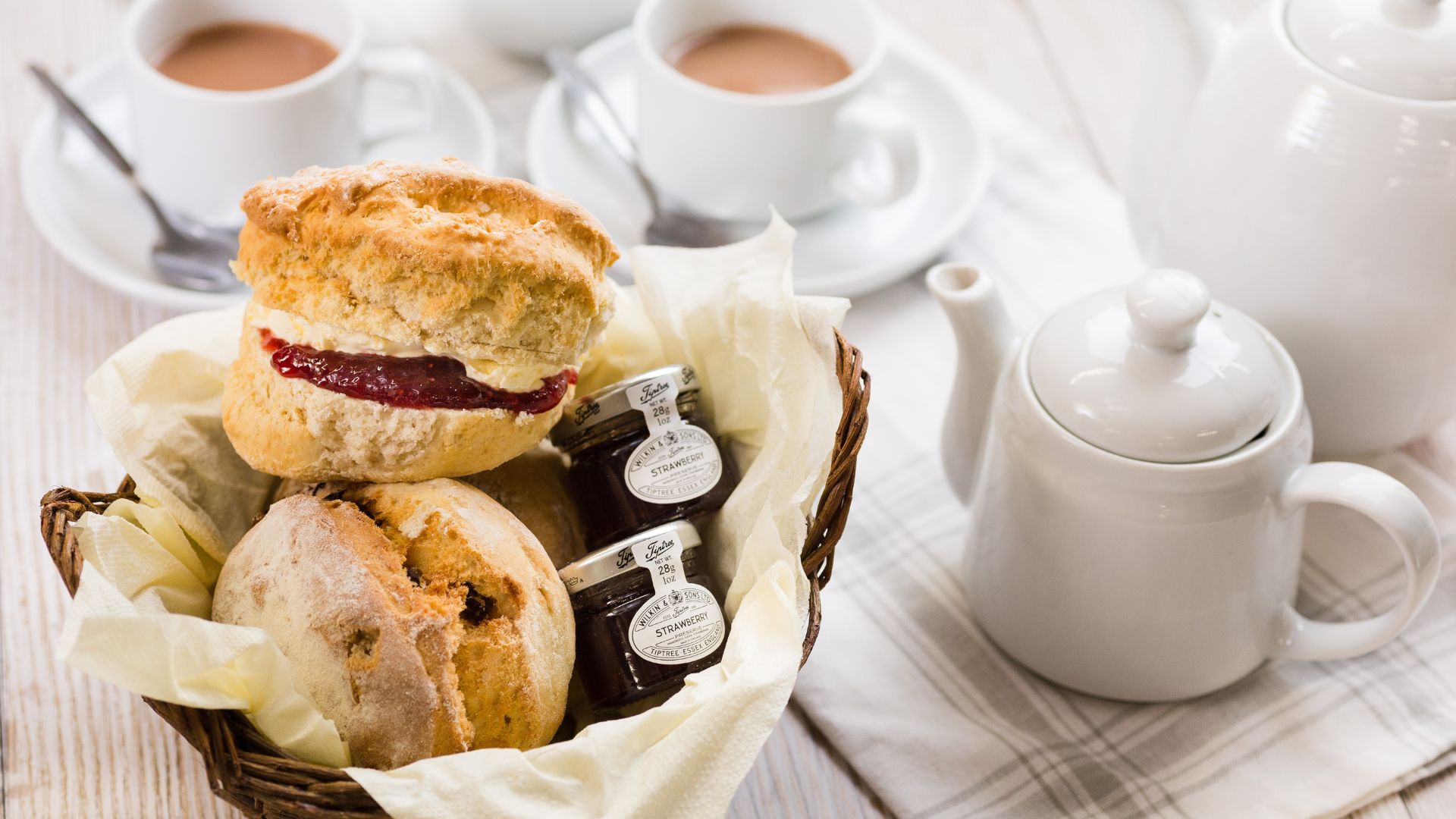 cream tea scones and pot of tea at cornwall gold